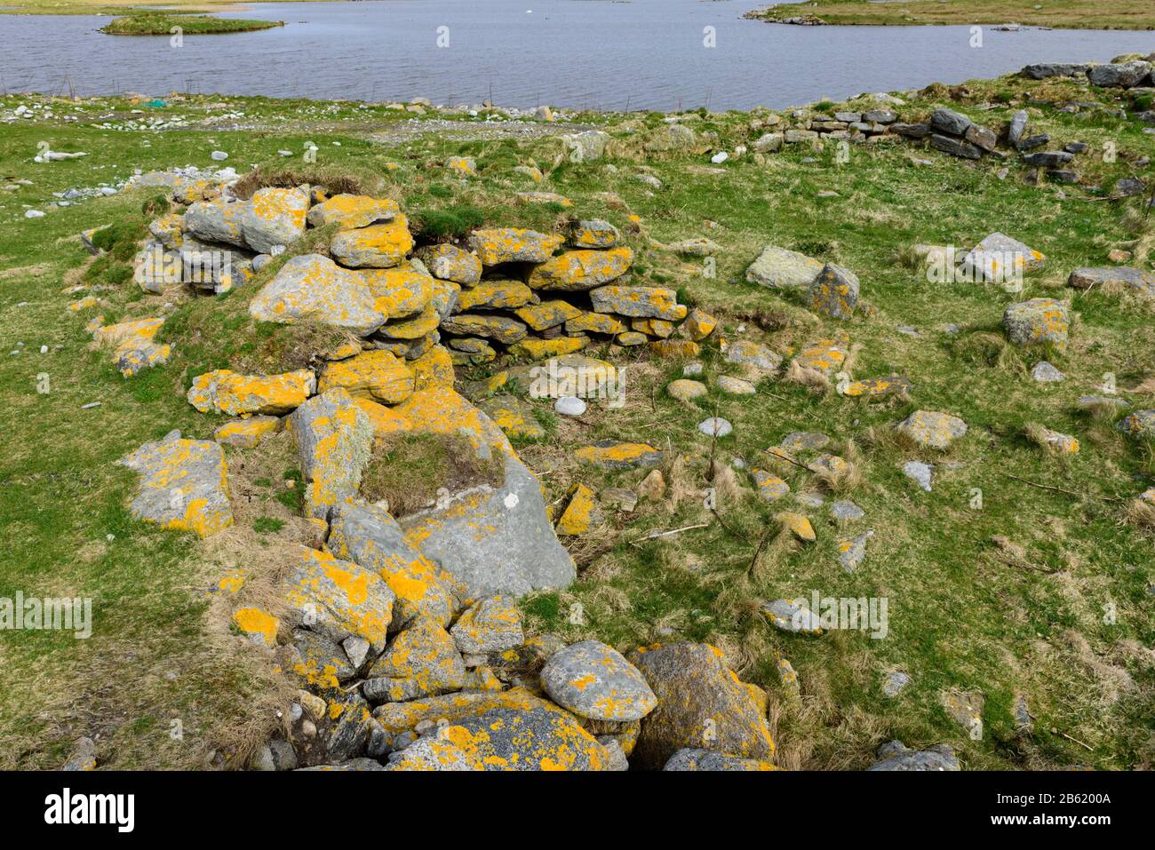Ruins of Dun Mhulan at Bornish on South Uist in the Outer Hebrides of Scotland Stock Photo