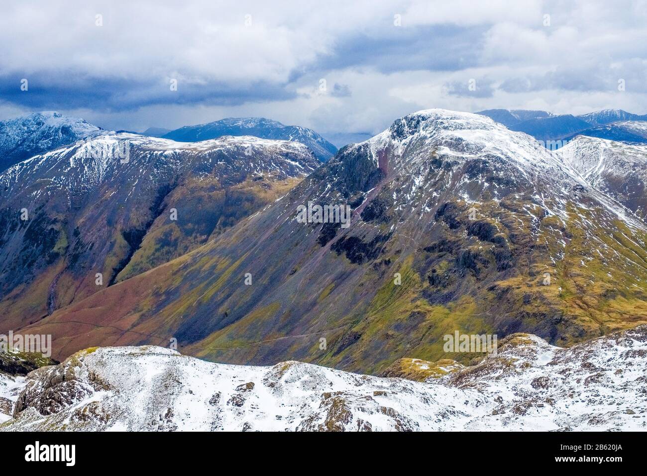 Great Gable as seen from Scafell with winter snow on summit , Lake District National Park, Cumbria Stock Photo