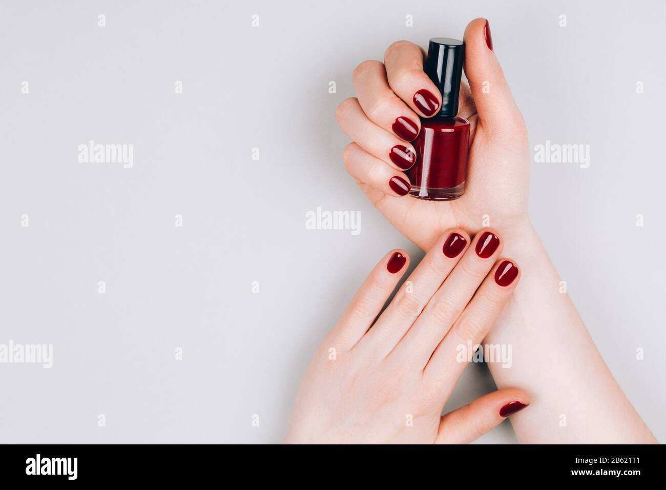 Hands red nail polish cover hi-res stock photography and images - Alamy