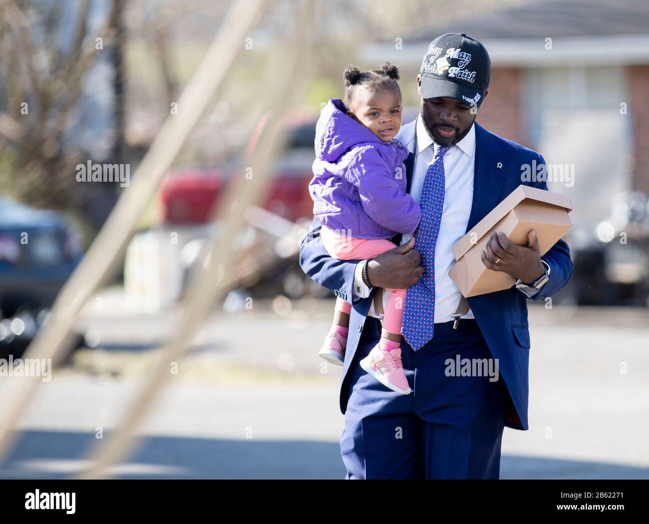 USA. 08th Mar, 2020. The Rev. Jaques Boyd carries his daughter, Ryan, 1, to the service Sunday, March 8, 2020, at Mount Bethel Missionary Baptist Church in Nashville. 030820mouthbethelchurchservice17 (Photo by Max Gersh/Commercial Appeal/Nashville Tennessean/Imagn/USA Today Network/Sipa USA) Credit: Sipa USA/Alamy Live News Stock Photo