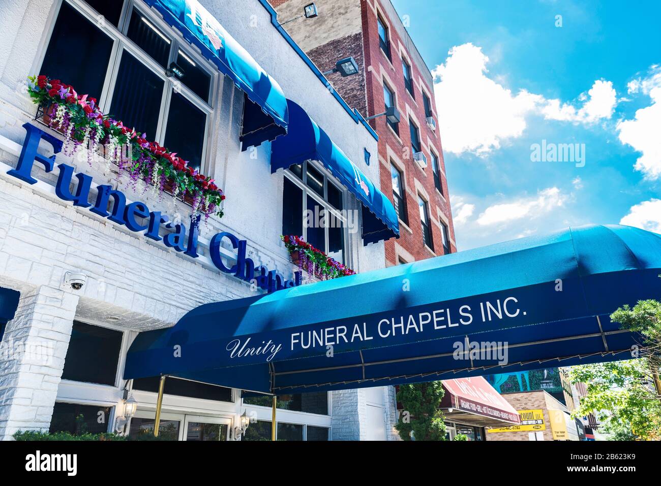 New York City, USA - August 4, 2018: Facade of the Unity Funeral Chapels in Harlem, Manhattan, New York City, USA Stock Photo