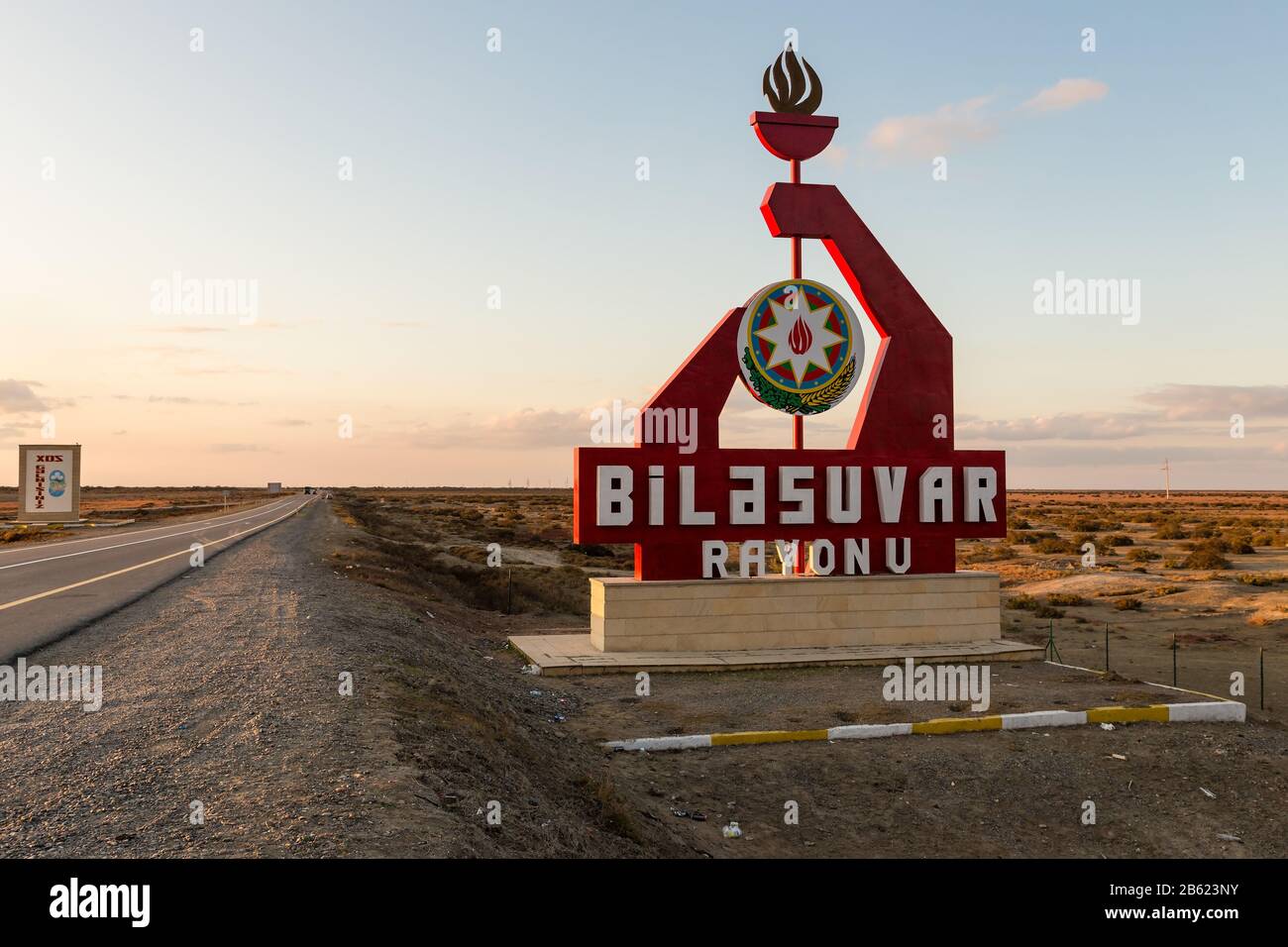 Bilasuvar, Azerbaijan - November 16, 2019: Entrance to the Bilasuvar District. Road sign at the entrance to Bilasuvar Rayon. Azerbaijan. Stock Photo