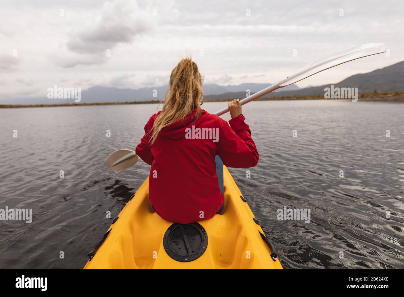 Caucasian woman doing kayak Stock Photo