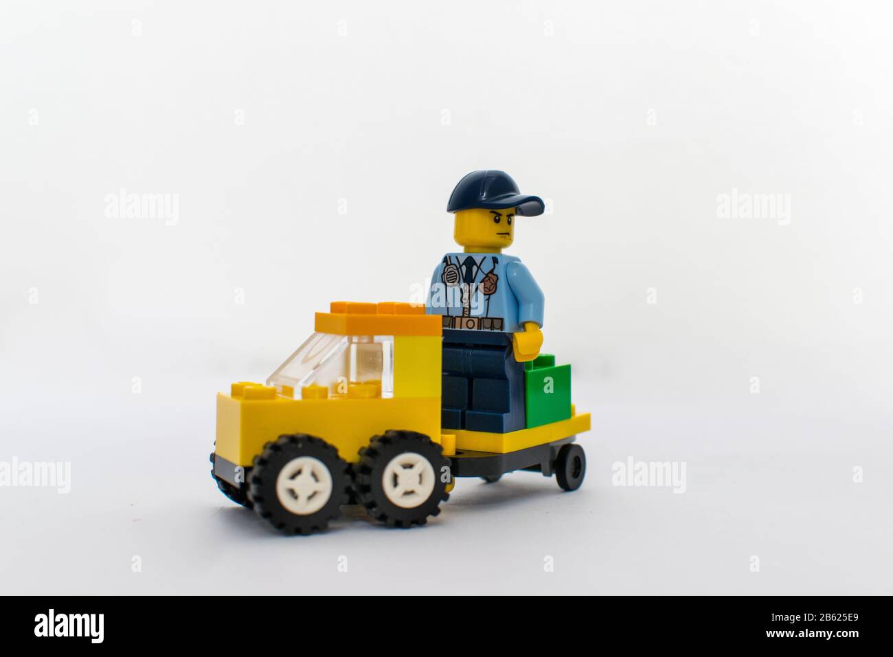Toy image of a toy car with a toy person Stock Photo