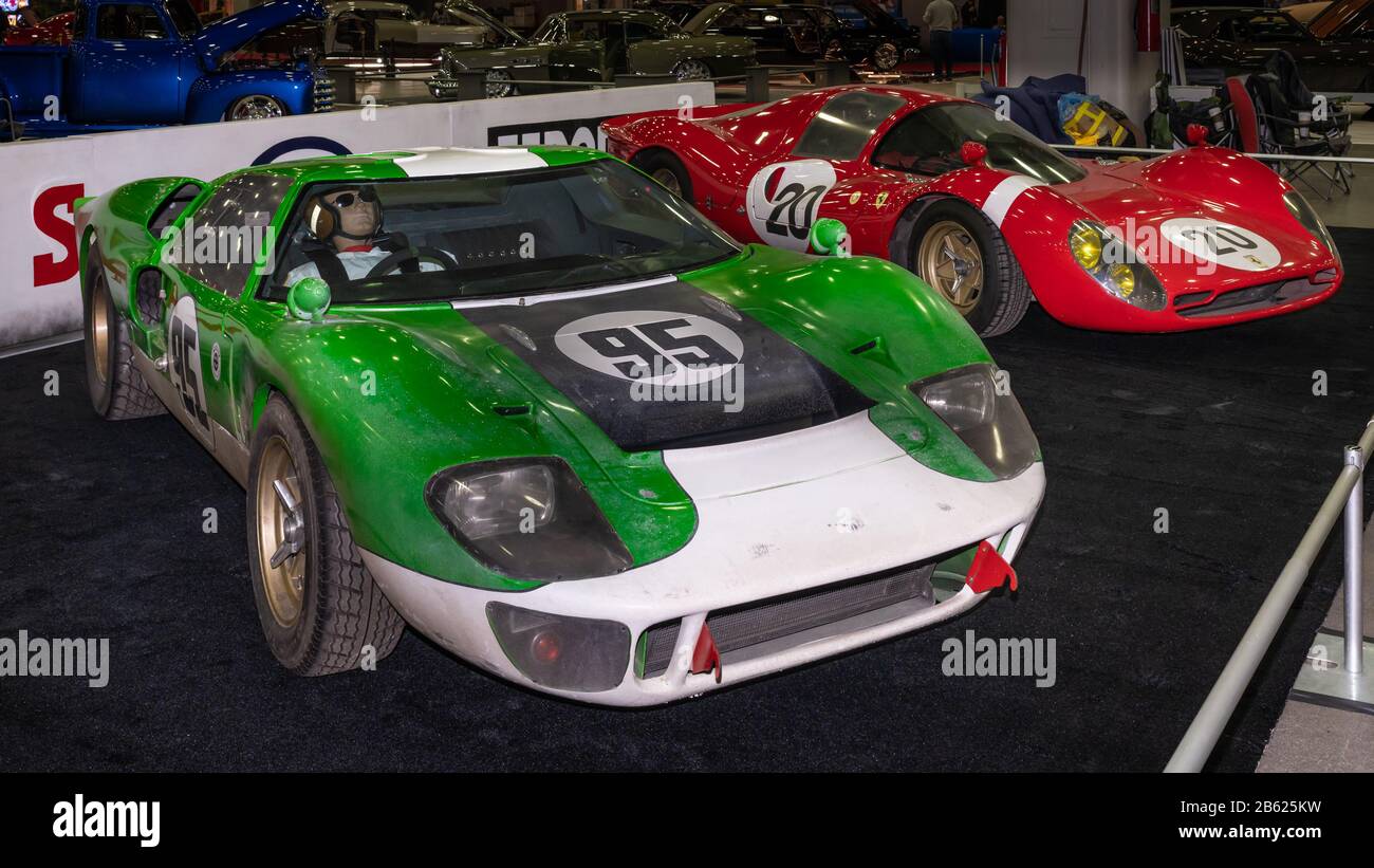 DETROIT, MI/USA - February 28, 2020: A Ford GT40 #95 and a Ferrari P330 #20 car used in the movie 'Ford v Ferrari', on display at the Detroit Autorama. Stock Photo