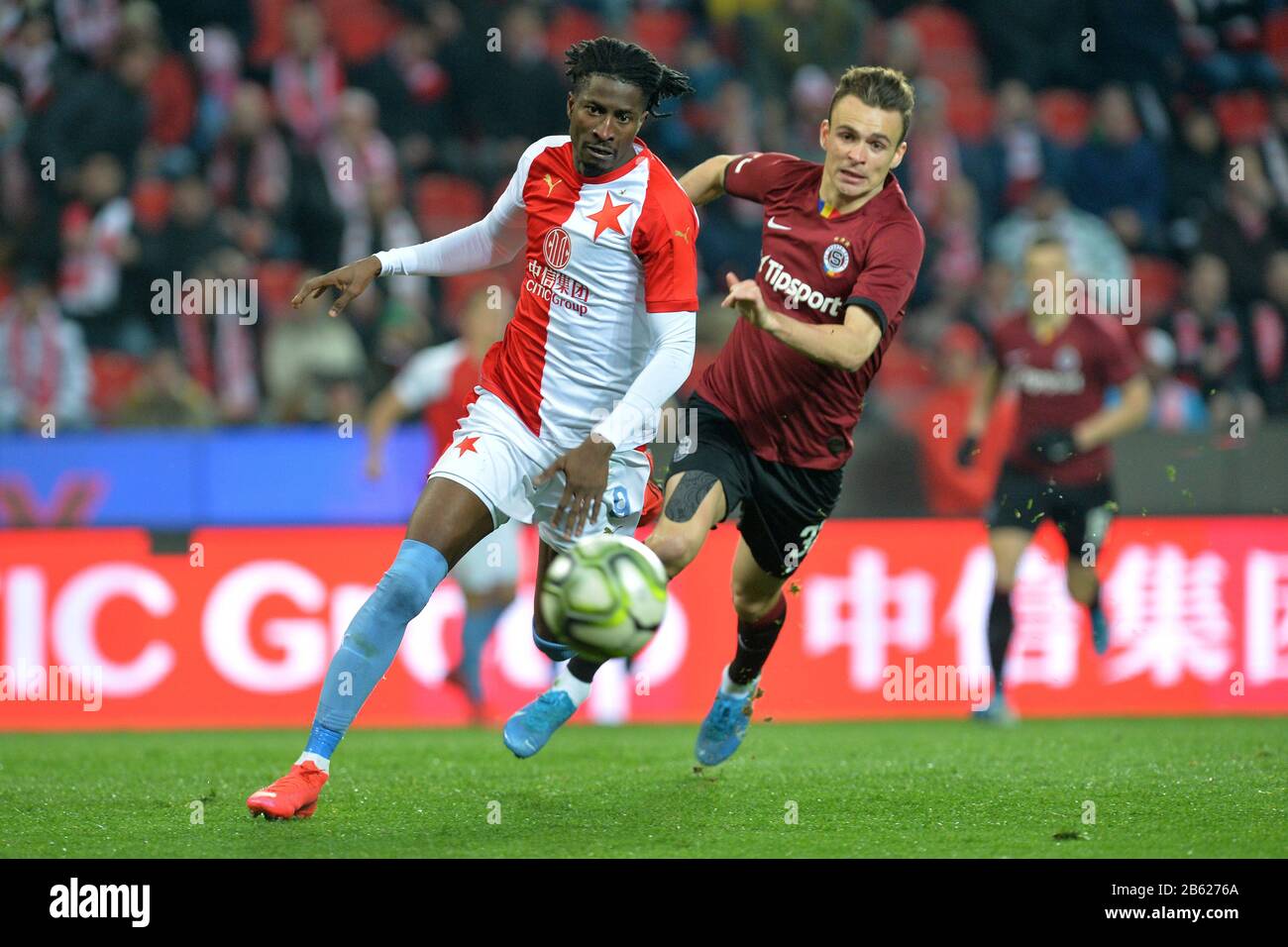 Prague, Czech Republic. 14th Apr, 2019. L-R Simon Deli (Slavia) and  Benjamin Tetteh (Sparta) are seen during the Czech first soccer league  (Fortuna Liga), 28th round, match SK Slavia Praha vs AC