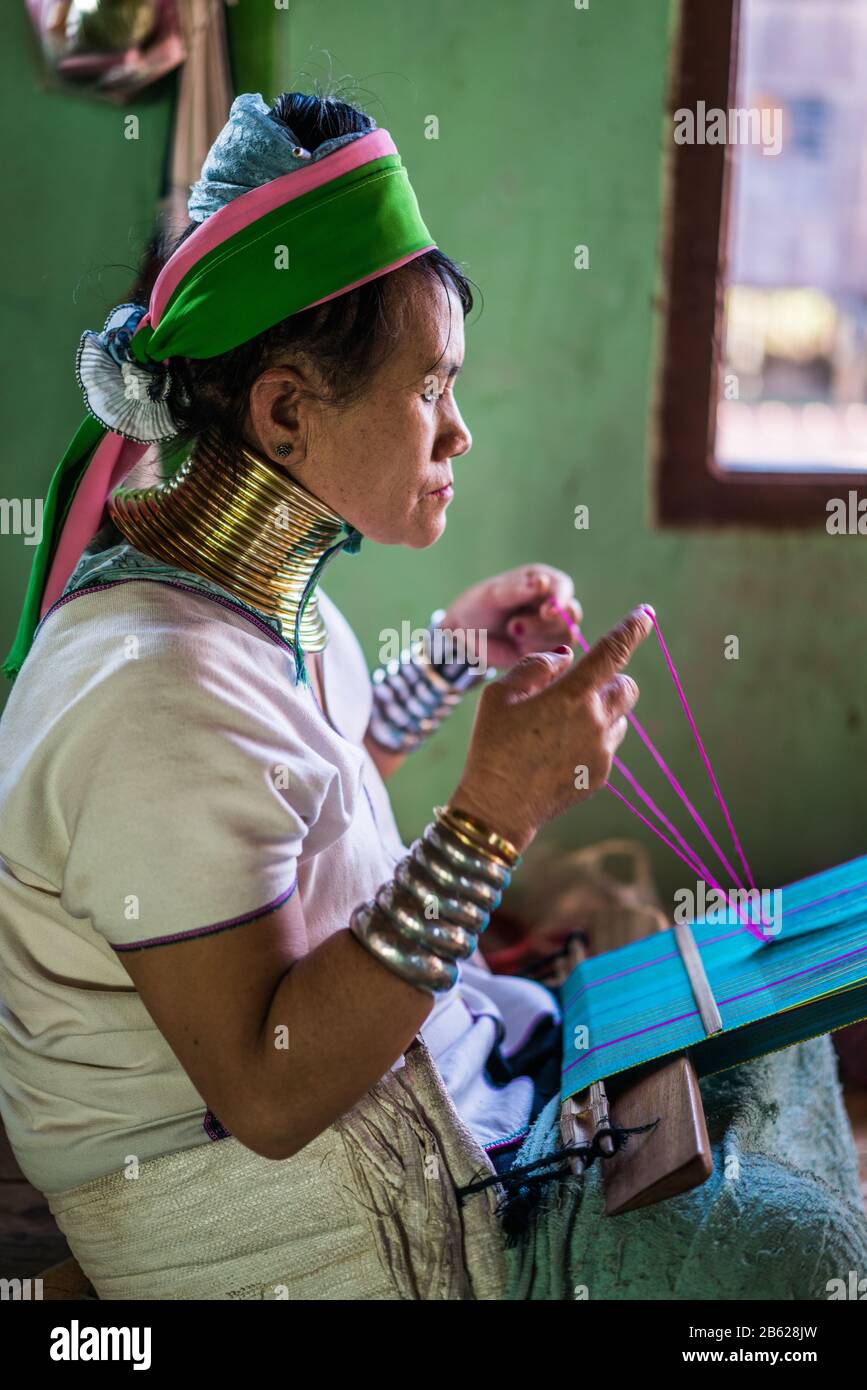 Portrait of the Long neck woman in their house, Inle lake, Myanmar, Asia. Stock Photo