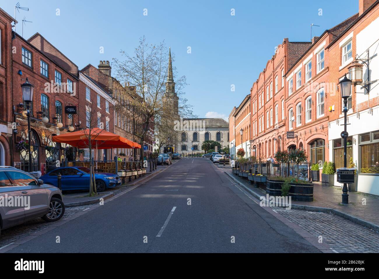 View up Ludgate Hill, Birmingham which is lined with bars and restaurants looking towards St Paul's Church in the Jewellery Quarter Stock Photo
