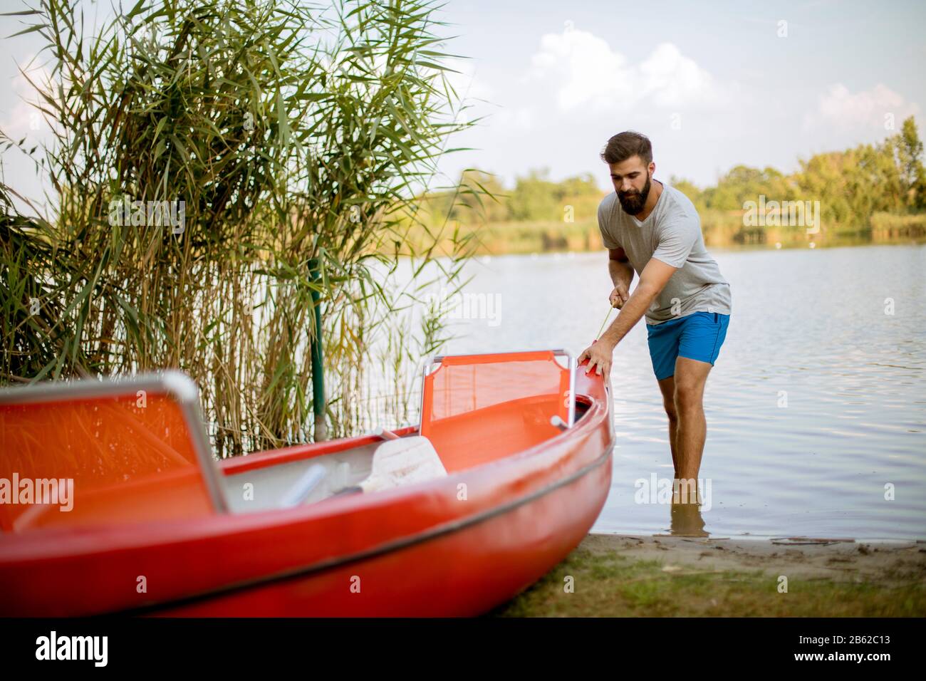 Handsome young man pulling hi-res stock photography and images - Alamy