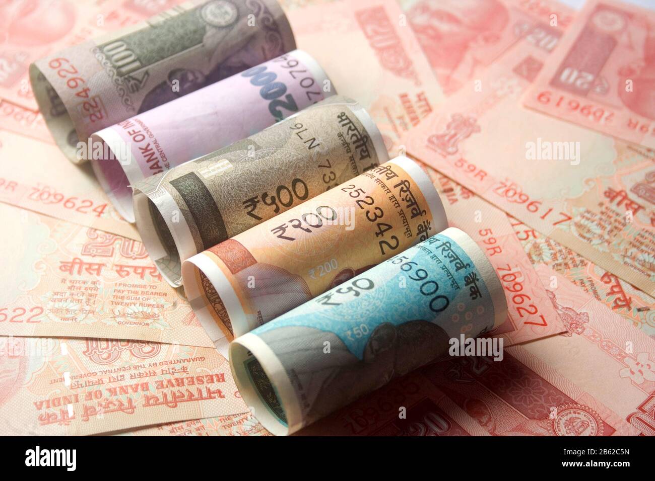 Indian new 200 and 500 .2000.50.100.20.Rs Currency Note.rolling and band rupees Stock Photo