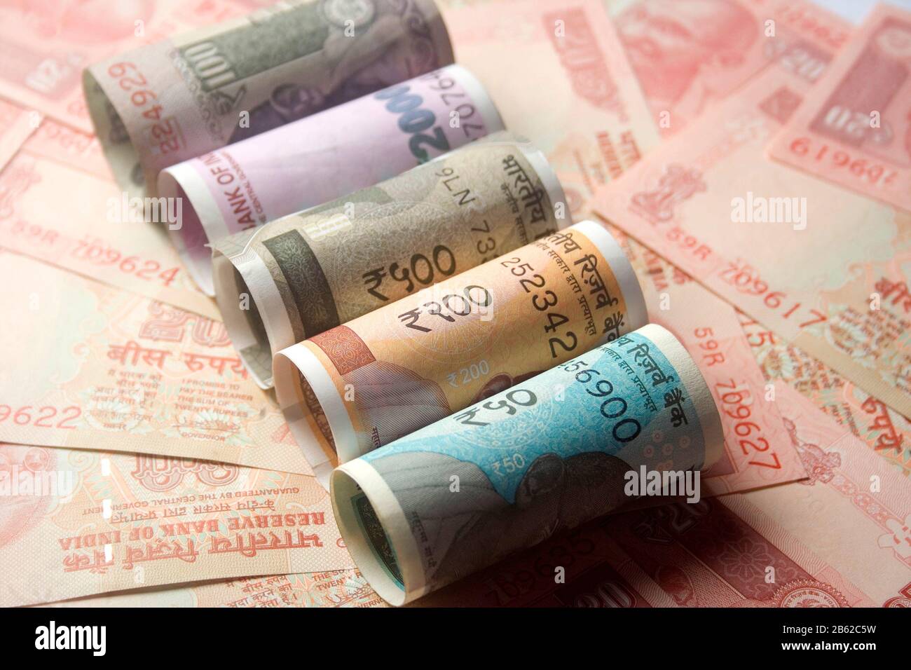 Indian new 200 and 500 .2000.50.100.20.Rs Currency Note.rolling and band rupees Stock Photo