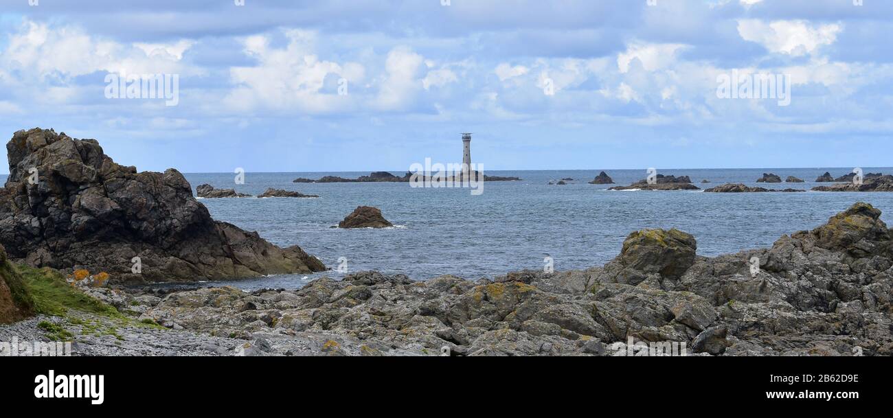 Les Hanois Lighthouse off Guernsey, Channel Islands Stock Photo