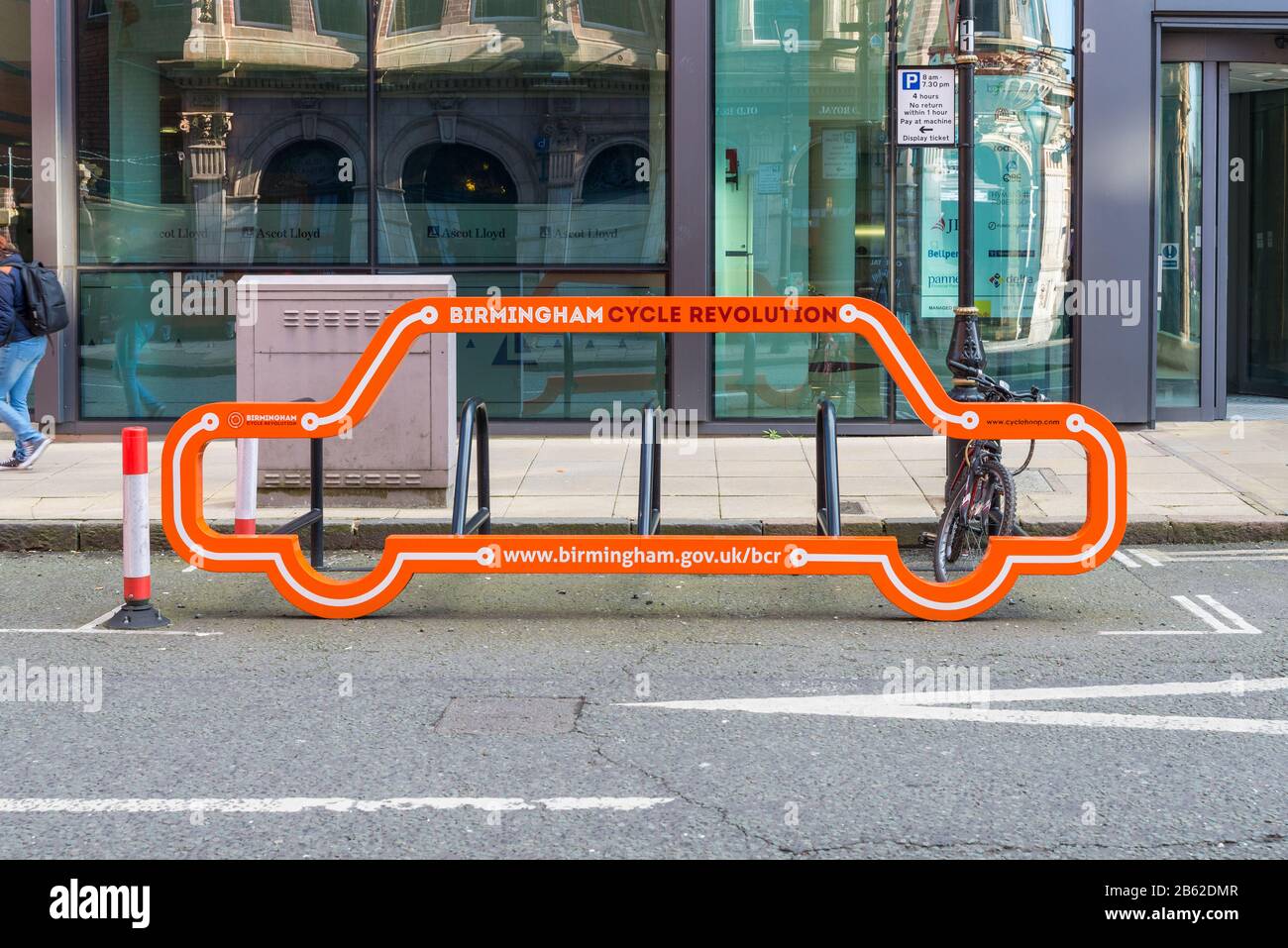 Birmingham Cycle Revolution bright orange storage rack for bicycles in Birmingham's business district Stock Photo