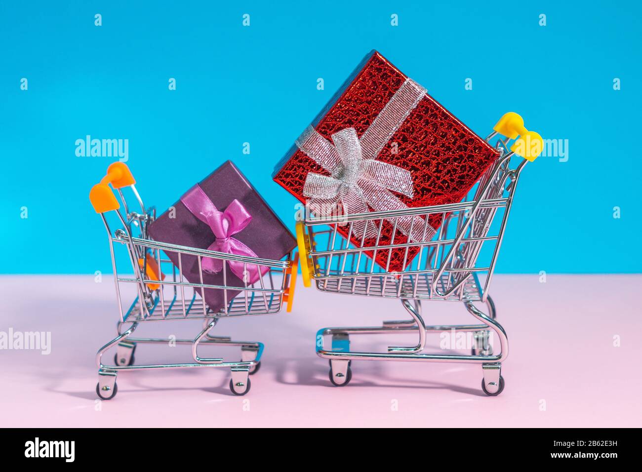 boxes with gifts, space for text on a blue background, copy space. the concept of shopping Stock Photo