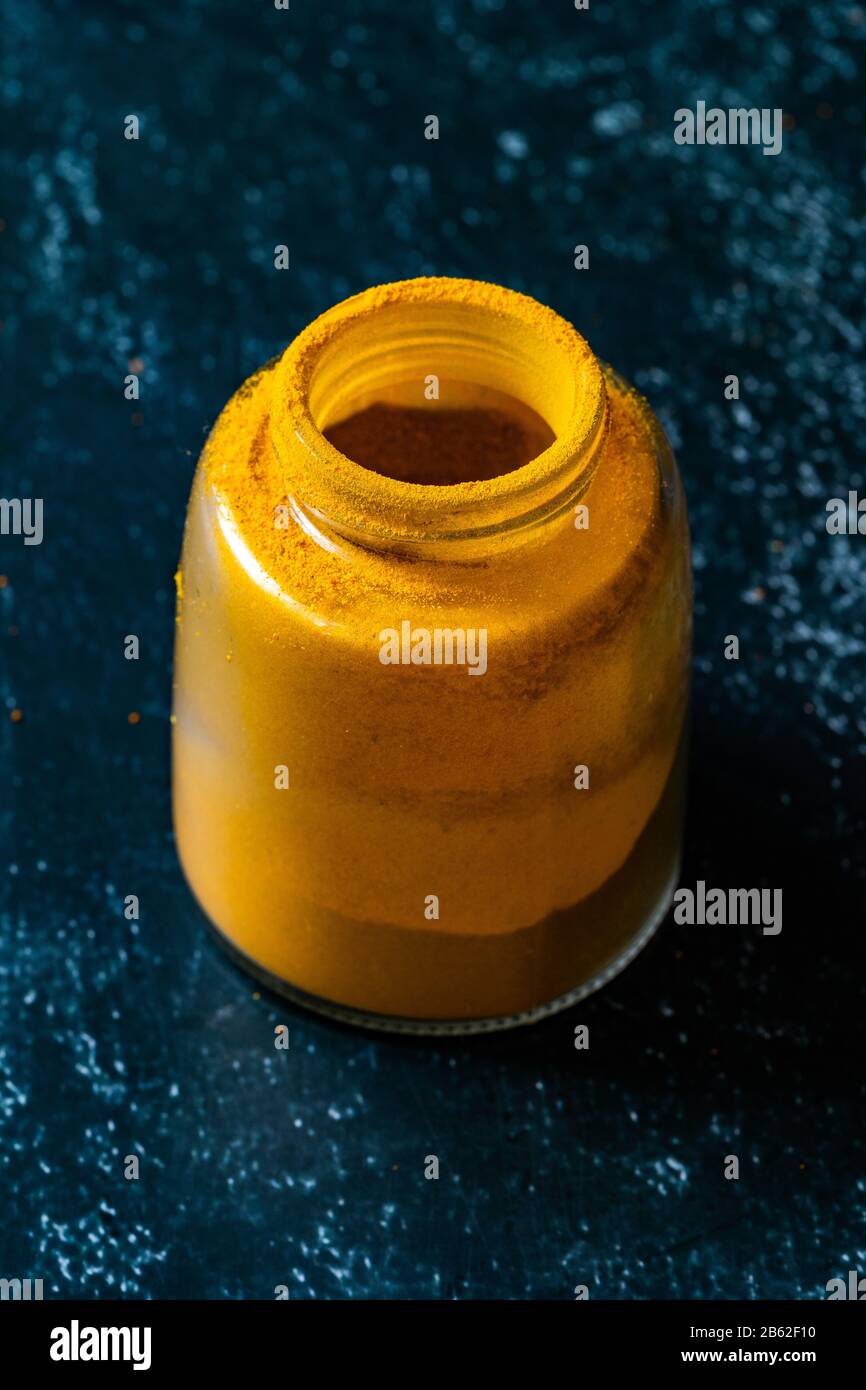 Turmeric Powder in Glass Spice Jar / Healthy Organic Powdered Version. Ready to Use Stock Photo