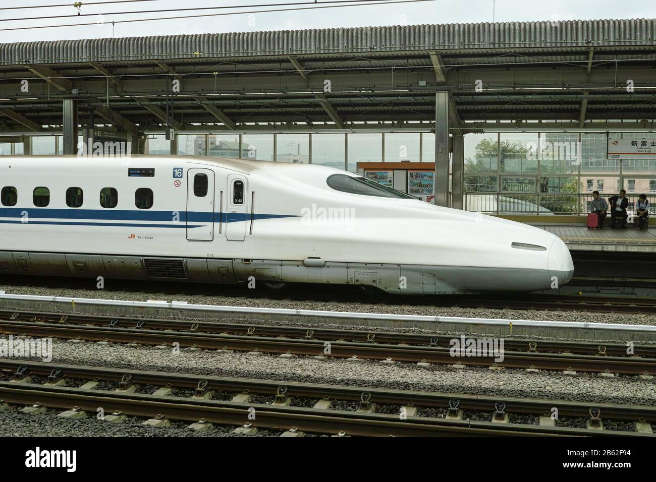 Yamanasi, Japan - 27 6 201: The iconic Shinkansen pulling into a more local station Stock Photo