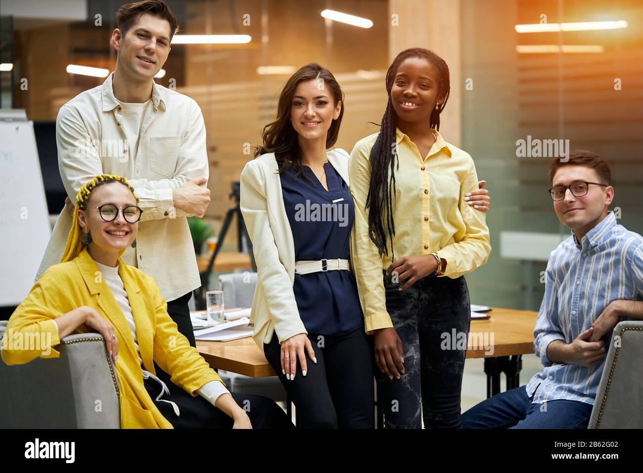 positive ambitious team is waiting for you in their company, don't miss the luck, success, friendship. relationship Stock Photo