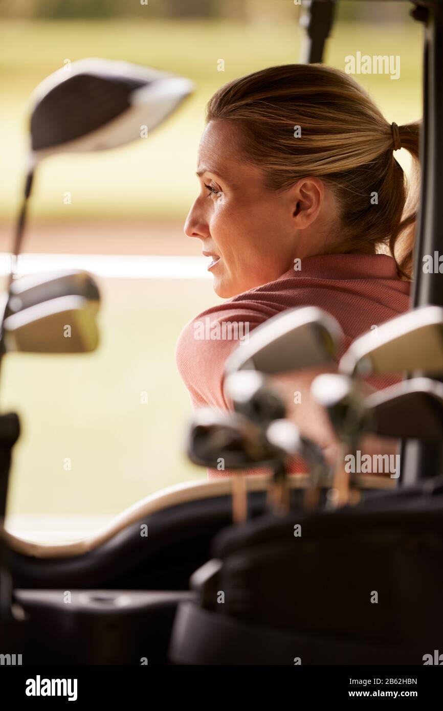 Rear view mature woman playing hi-res stock photography and images - Alamy