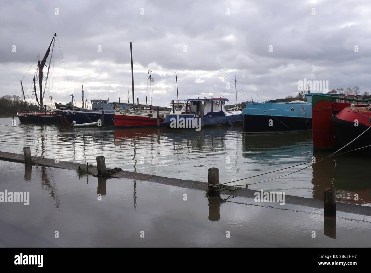 Woodbridge, Suffolk, UK - 9 March 2020: High tide. Wet and windy afternoon walk alongside the River Deben from Woodbridge to Melton. Stock Photo