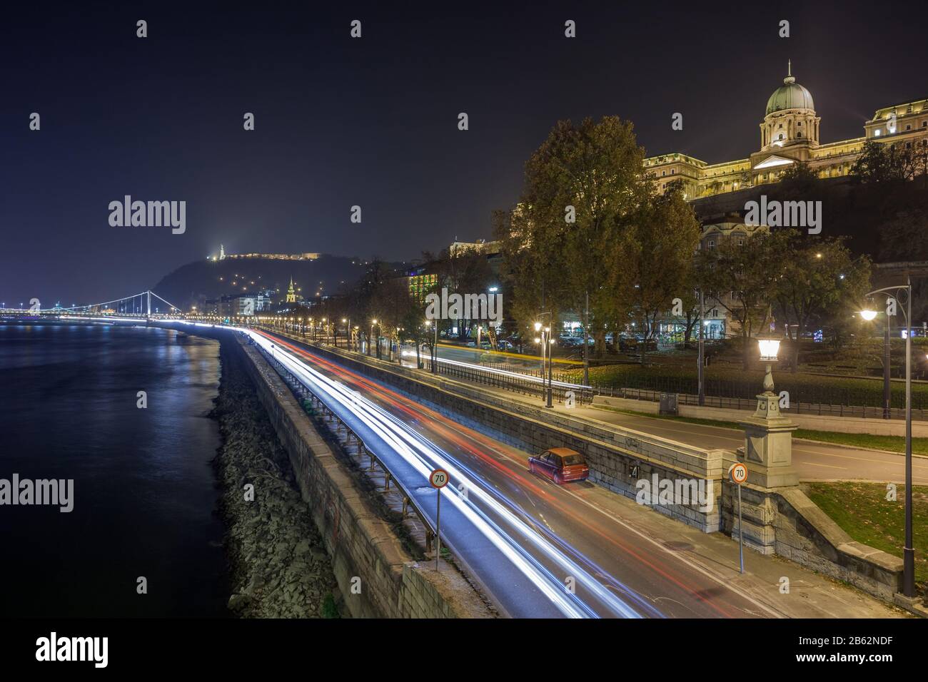 Buda Castle, Royal Palace by the Danube river illuminated at night in ...