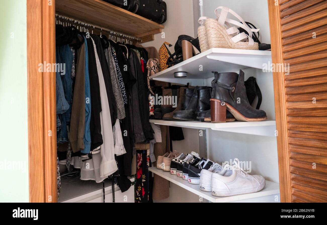 Walk in wardrobe with clothes and shoes hi-res stock photography and images  - Alamy