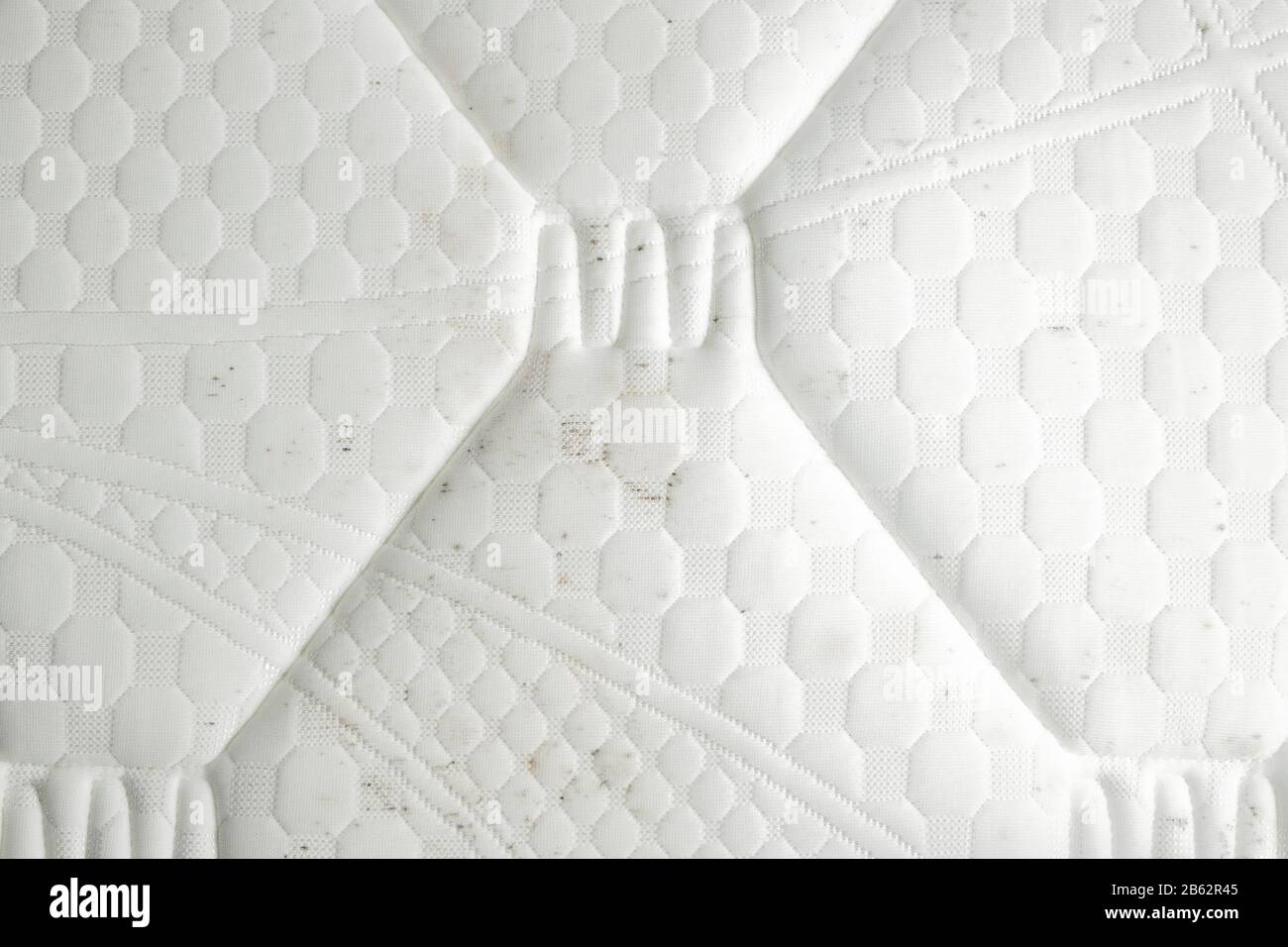 Mold on a mattress. Black stains on a white fabric Stock Photo Alamy