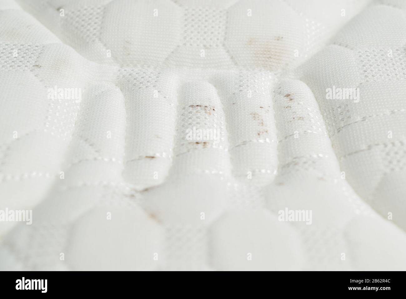 Mold on a mattress. Black stains on a white fabric Stock Photo Alamy