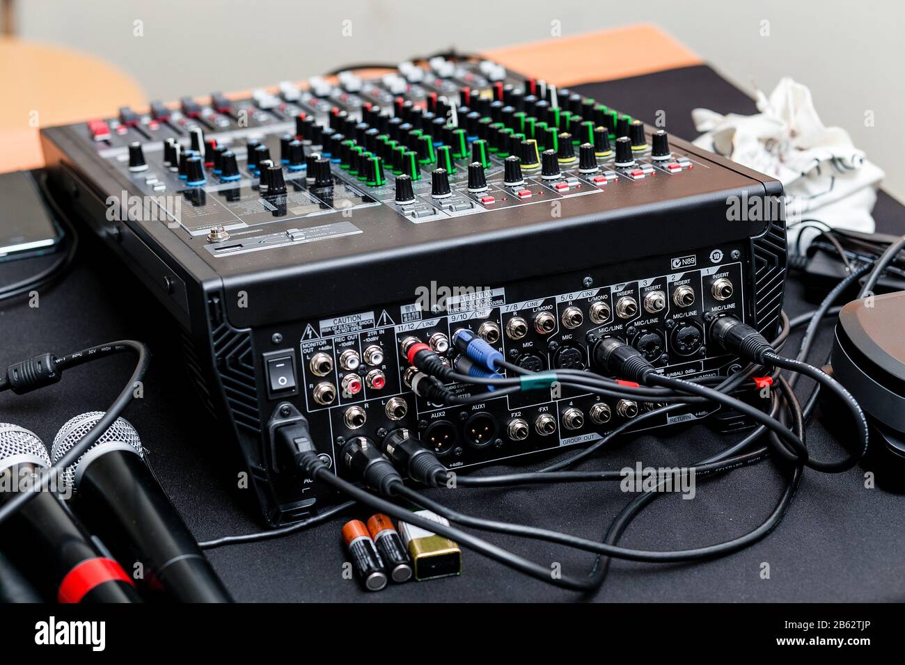 Audio mixer console and microphone with plugs, rear view Stock Photo ...