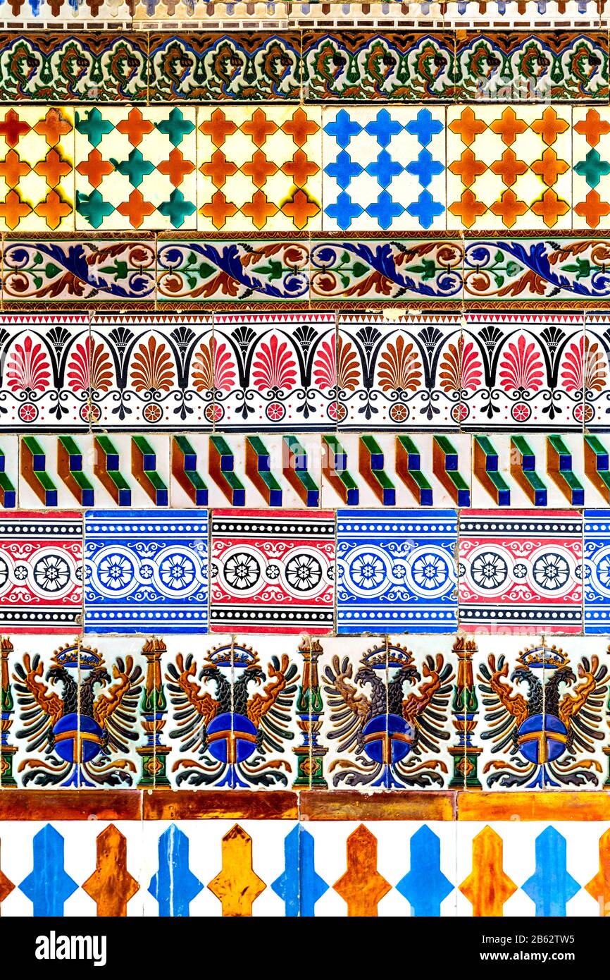 Colourful Spanish azulejo ceramic glazed tiles at Museo de Arte Andaluz Contemporaneo, a former 15th century monastery, Seville, Spain Stock Photo