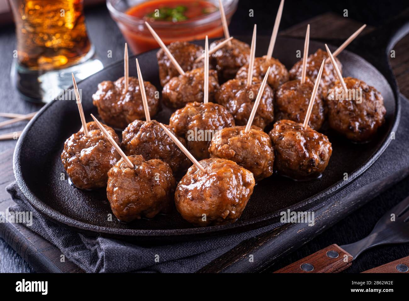A platter of delicious sweet and spicy meatballs. Stock Photo