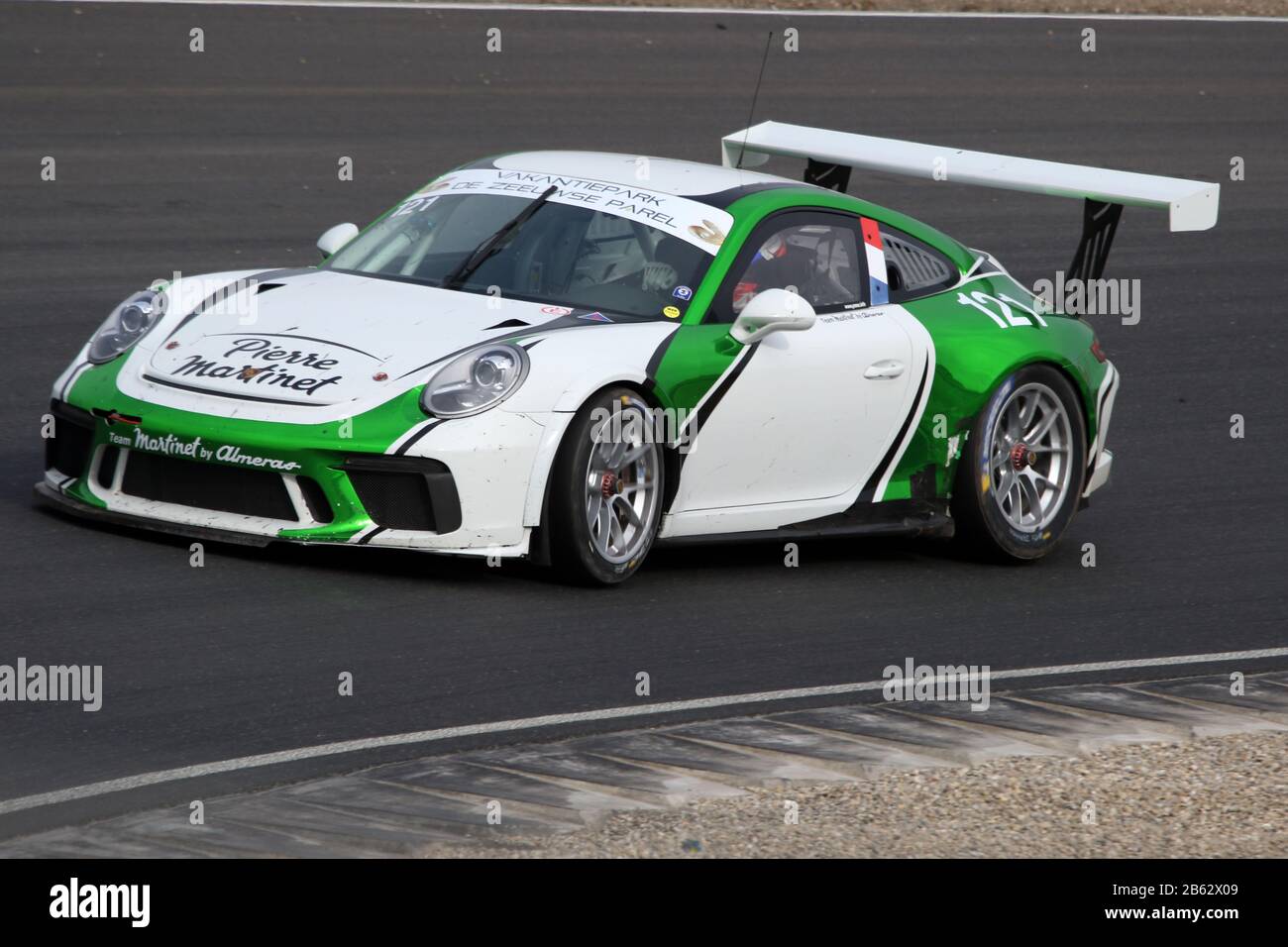 White and green Porsche 991 GT3 in action during the final of the winter championship The final 4 endurance race. On the renewed race track of Zandvoo Stock - Alamy