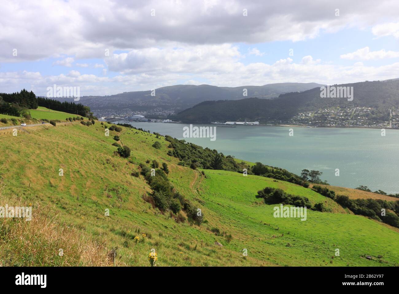 Akaroa Harbour, is part of Banks Peninsula in the Canterbury region of New Zealand. Stock Photo