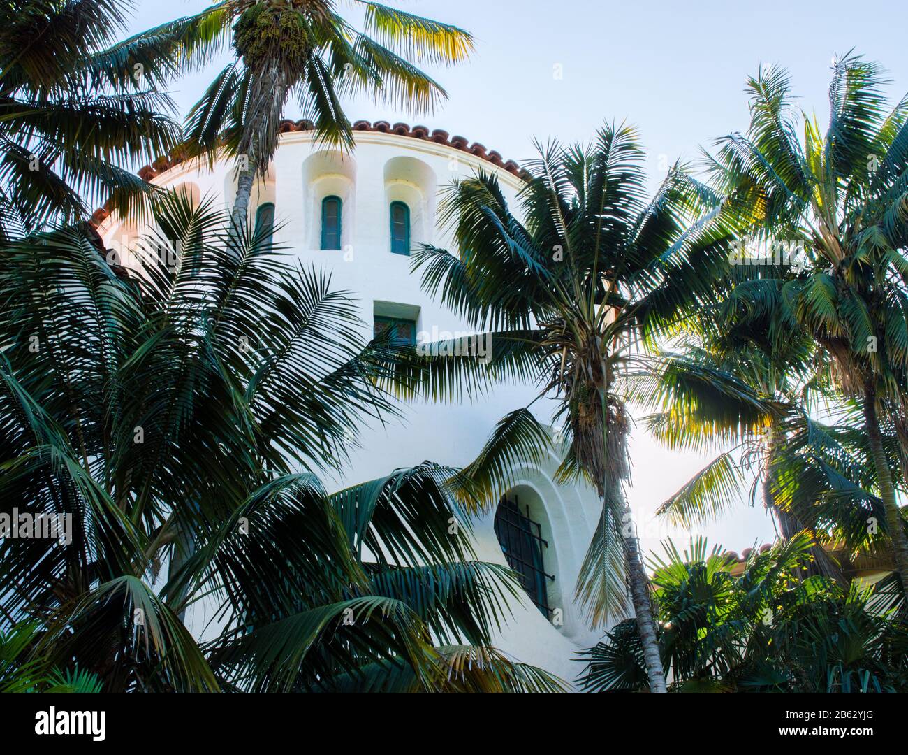 majestic Spanish style jail tower at the historic Santa Barbara County courthouse in California surrounded by lush palm trees Stock Photo