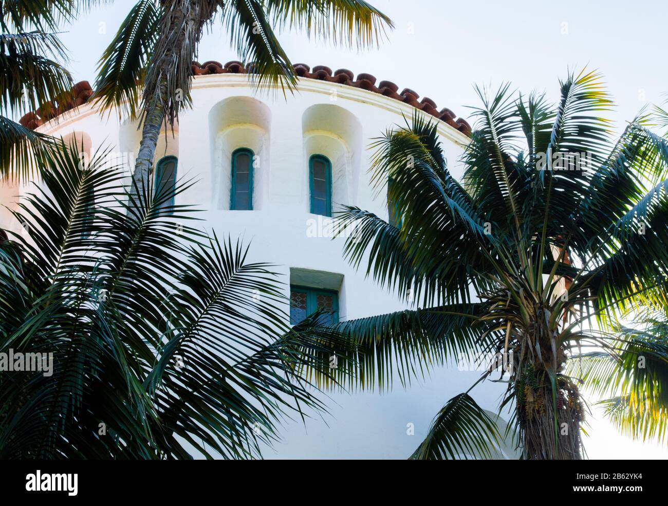 majestic Spanish style jail tower at the historic Santa Barbara County courthouse in California surrounded by lush palm trees Stock Photo