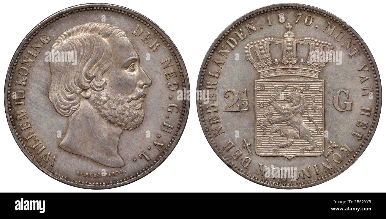 The Netherlands Dutch silver coin 2-1/2 two and a half gulden 1870, head of King Willem III right, crowned shield with lion holding sword and bunch of Stock Photo