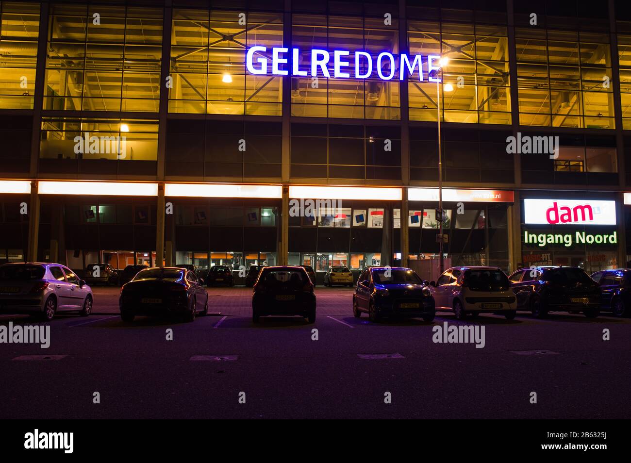 Arnhem, Netherlands - March 4, 2020: The front of Gelredome at night. Gelredome is a football stadium in the city of Arnhem Stock Photo