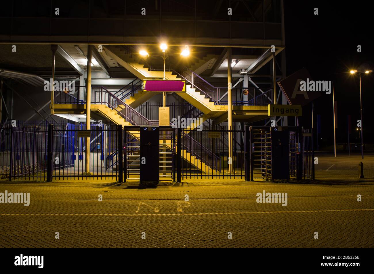 entrance to a grandstand of a large stadium at night, Gelredome in Arnhem Stock Photo