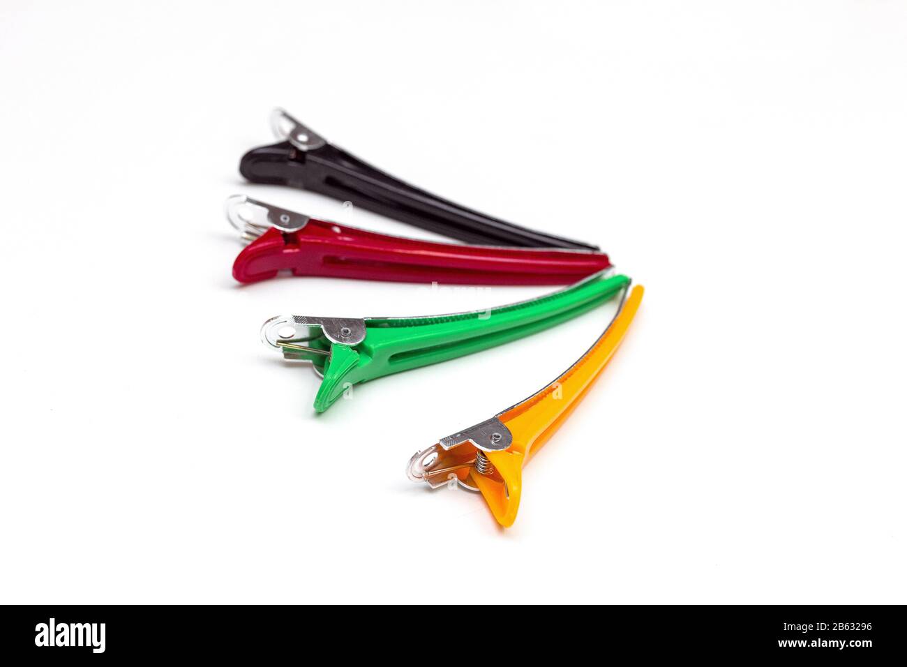 Colored hair clips isolated on white background Stock Photo - Alamy