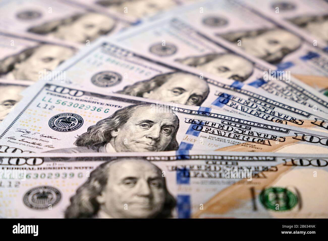 US dollar on background of dollars bills. Concept of american and global economy, exchange rate Stock Photo