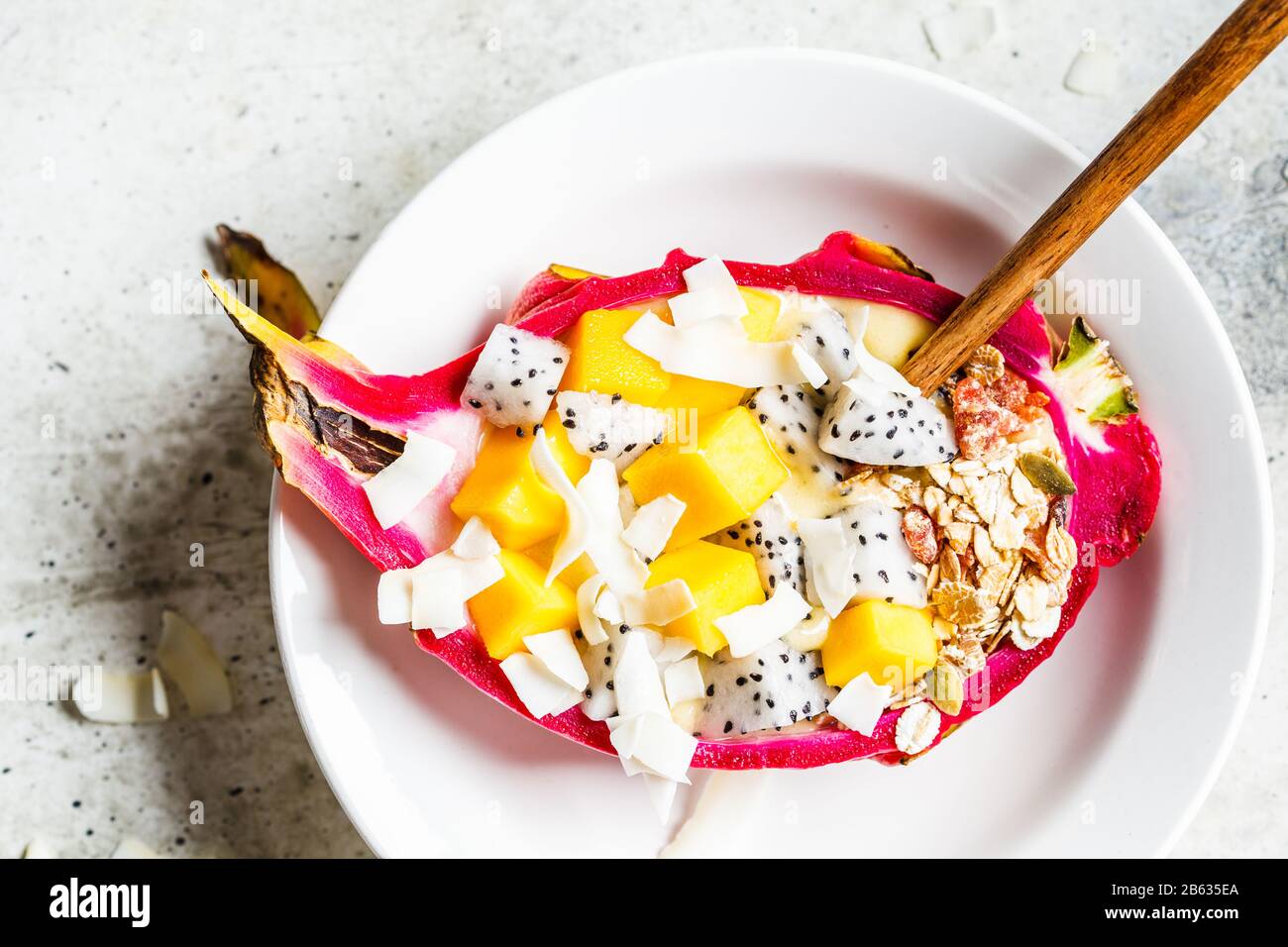 Mango Smoothie With Granola And Coconut Chips In Dragon Fruit Healthy Breakfast Concept Stock Photo Alamy Mango Smoothie With Granola And Coconut Chips In Dragon Fruit Healthy Breakfast Concept Stock Photo Alamy