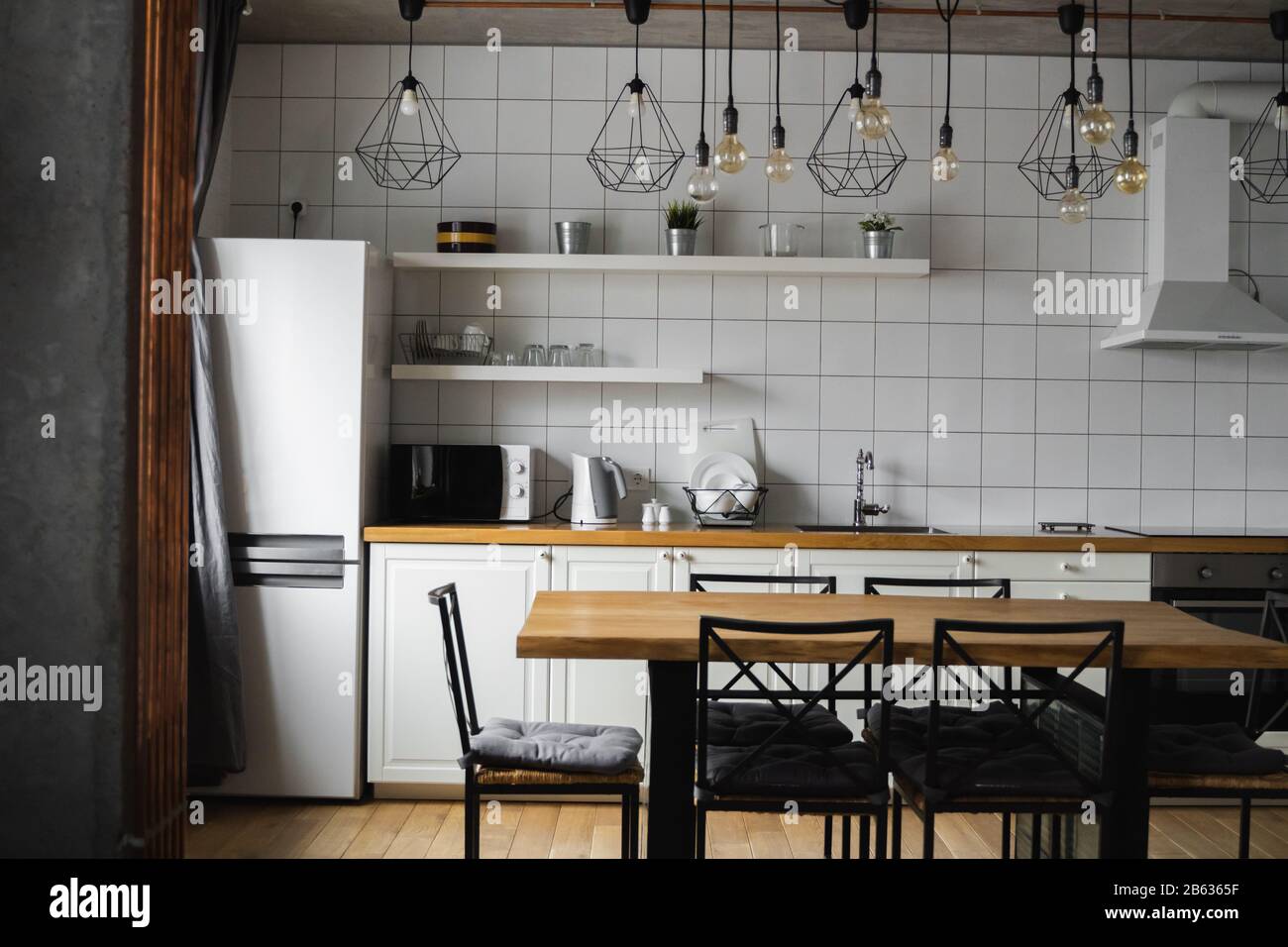 Modern, bright, clean, kitchen interior with stainless steel appliances ...