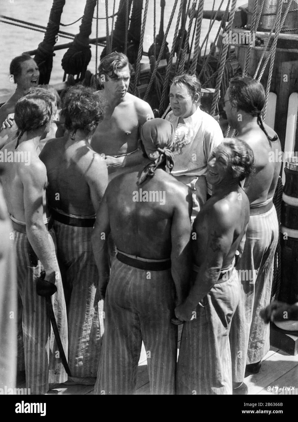 CLARK GABLE as Fletcher Christian and CHARLES LAUGHTON as Captain Bligh