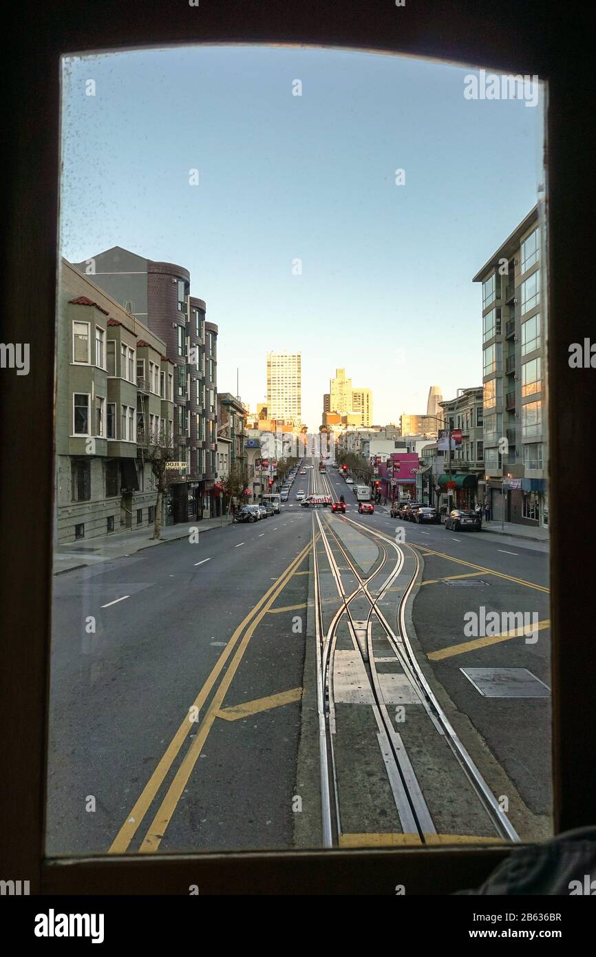 Tracks on California Street in San Francisco seen through the window of a cable car Stock Photo