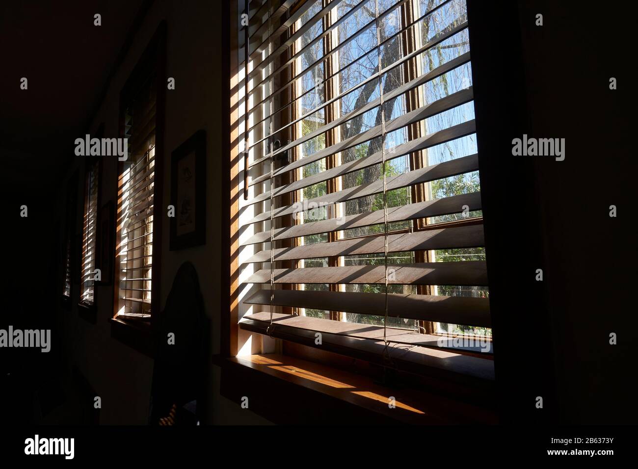 Windows with wood blinds. Stock Photo