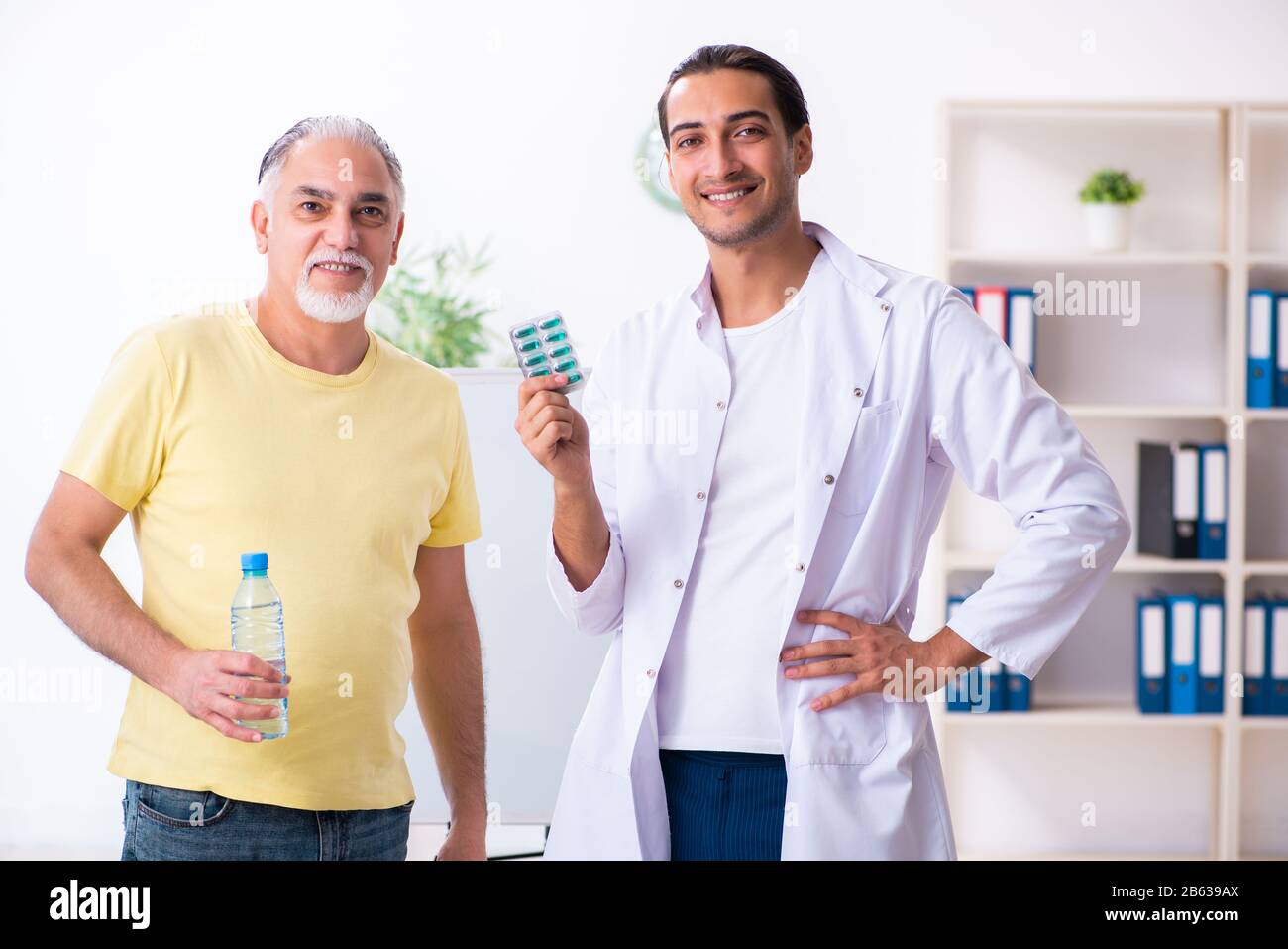 The doctor dietician giving advices to fat overweight patient Stock