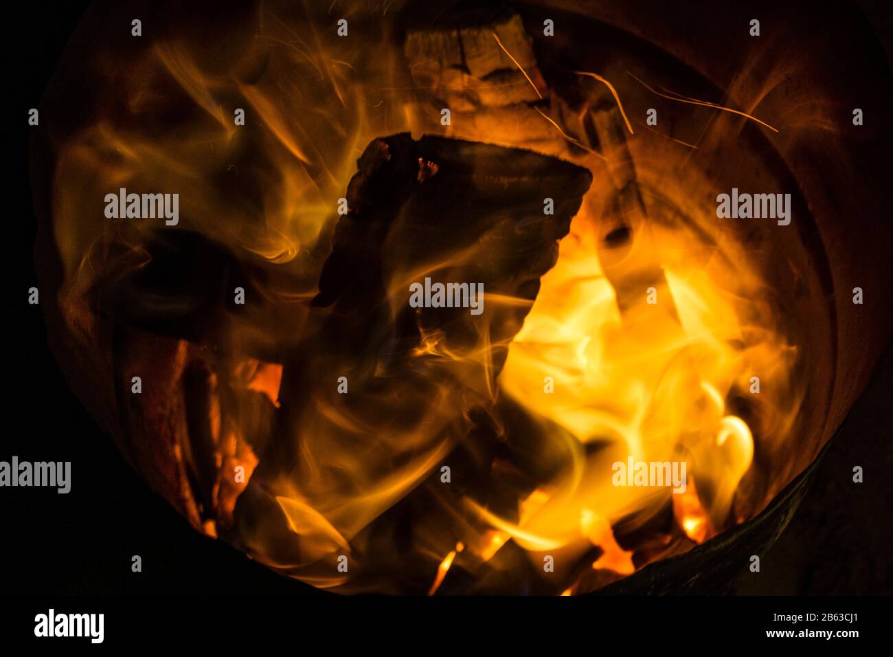 A log burns in a fire. Hot temperature Stock Photo Alamy