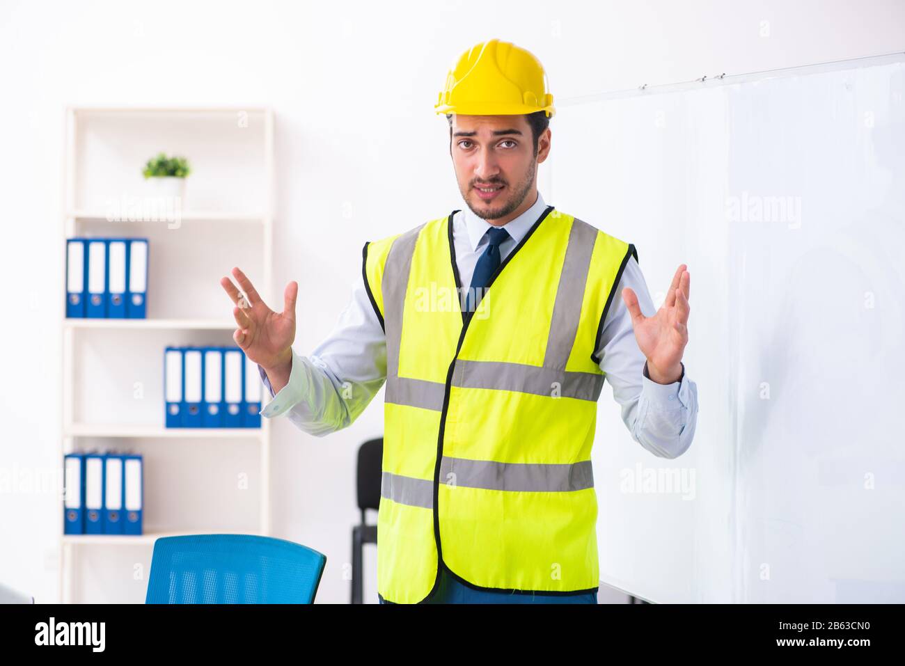 Young architect in presentation concept Stock Photo