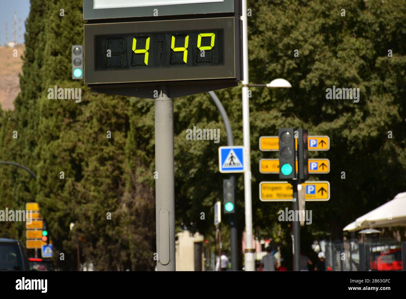 Street thermometer on a city street marking 44 degrees celsius Stock Photo