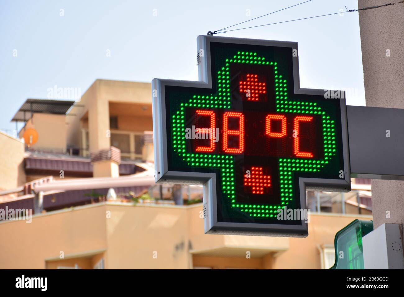 street thermometer of a pharmacy at 38 degrees celsius Stock Photo