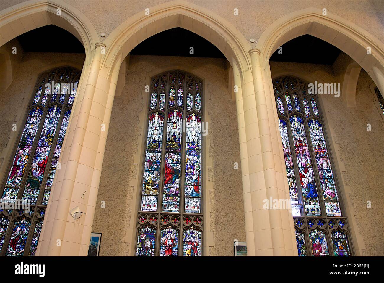 Cross inside church stained glass hi-res stock photography and images ...